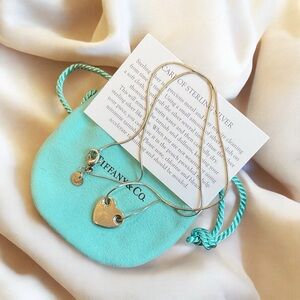 Tiffany & Co. Silver Threaded Pierced Heart Pendant with Turquoise Pouch